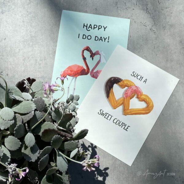 Mood image of 2 original AmuzAnt greeting cards; one with an illustration of 2 flamingos and the text "Happy I Do Day!", and one with churros and the words: "Such a sweet couple". Perfect wedding day greeting cards.